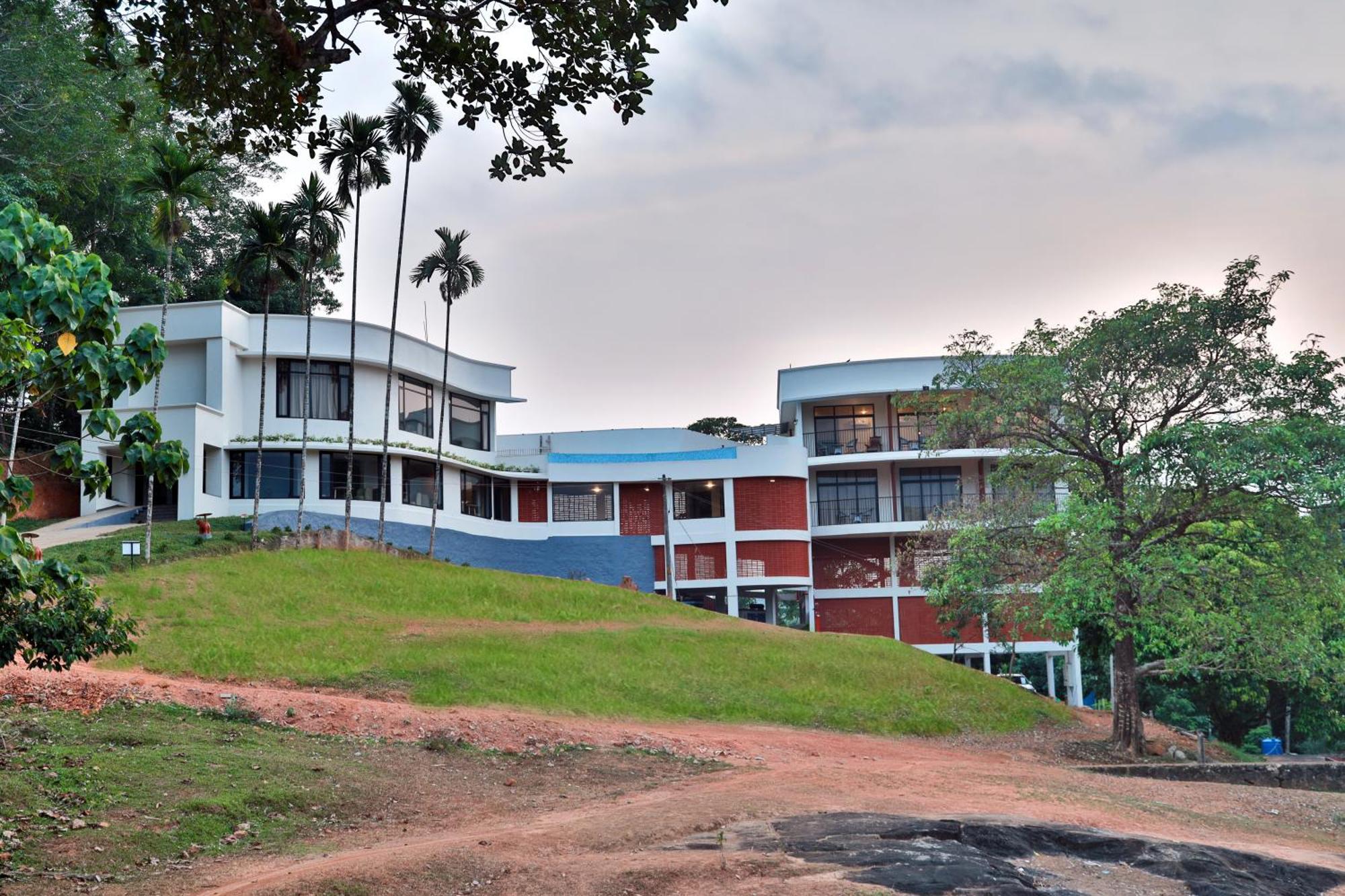 מלון Mennanyam Serene Aqua Hills Kozhikode מראה חיצוני תמונה
